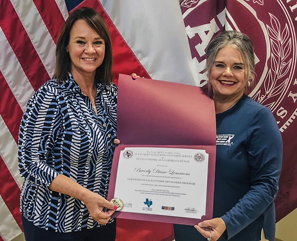 Diane Lemmons of The Colony EDC receiving her CTED accreditation.