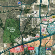 Aerial map of The Colony and surrounding area highlighting a site along Main Street/FM 423, with nearby neighborhoods, The Colony City Offices, Stonebriar Country Club, Stonebriar Centre, major retailers, and SH 121 shown for location context.